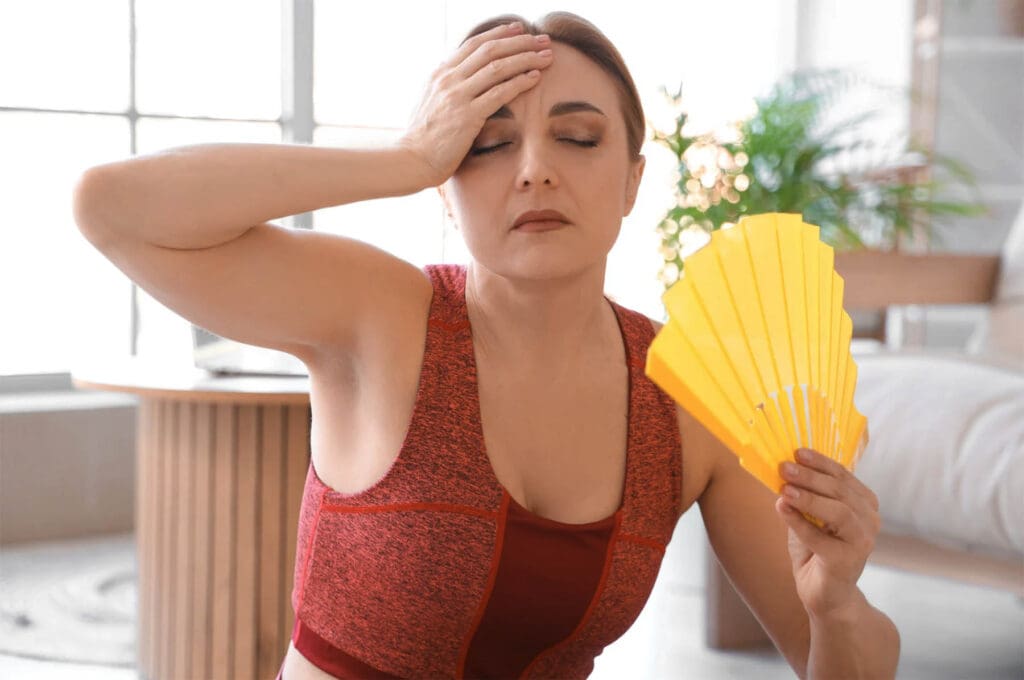 Common symptoms of perimenopause including mood swings, fatigue, weight gain, and hot flashes